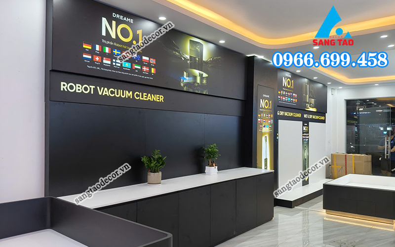 Chi tiết thi công nội thất showroom Dreame với hệ tủ kệ tối giản và tranh điện, một giải pháp thiết kế showroom hiện đại và đẳng cấp